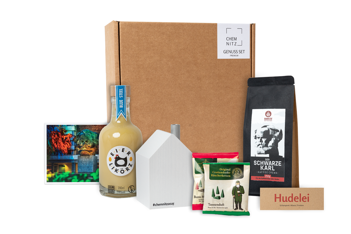 Genuss Set Chemnitz Premium mit Eierlikör, Kaffee 'Der Schwarze Karl', Crottendorfer Räucherkerzen und einem weißen Räucherhaus in brauner Geschenkbox.