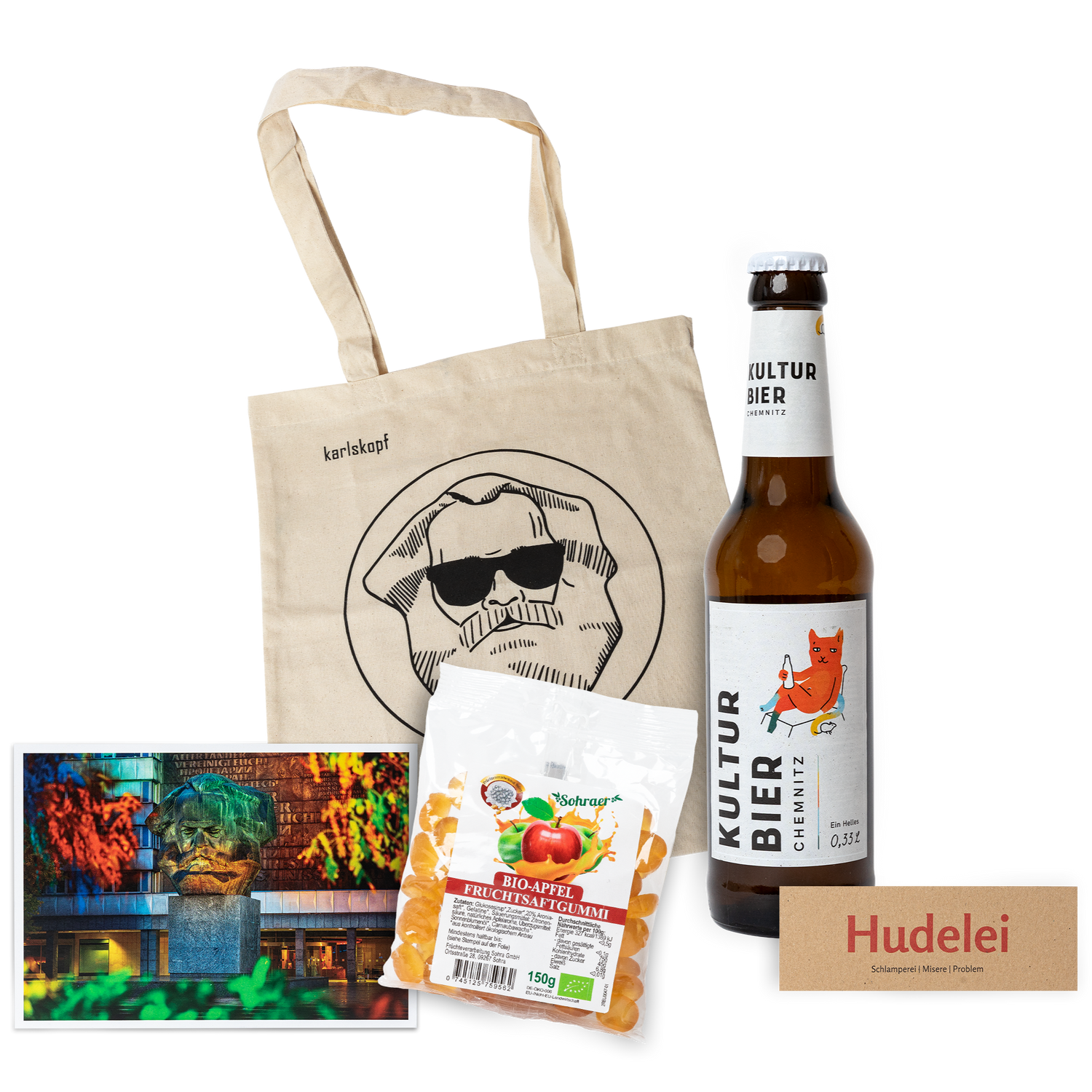Genuss Set Chemnitz Light mit Kulturbier Flasche, Bio-Apfel Fruchtsaftgummi, Stofftasche mit Karlskopf-Logo und Postkarte mit Karl-Marx-Denkmal